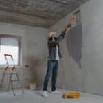 Man Painting the Wall