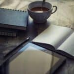 Cup Filled With Coffee Near Book