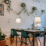 Interior of cozy modern dining room with chairs and table