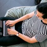 Photo Of Man Using Laptop