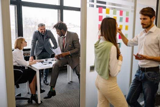 Group Of People Discussing About Work