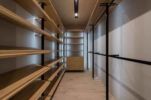 Interior of wardrobe with wooden shelves